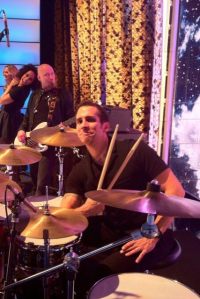 Al Wilson and Amos J. Heller trade instruments