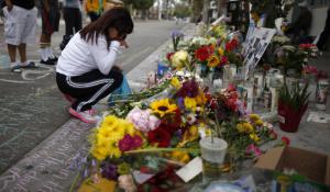 A memorial for Christopher Michael-Martinez, 20, a University of California, Santa Barbara, student who was killed outside a deli during a shooting rampage that left seven dead. (Photo: Lucy Nicholson / Reuters)